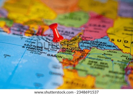 Map of Equatorial Guinea with a red pushpin stuck
