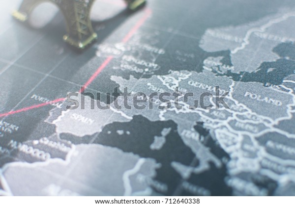 Map of Europe and the red line\
divides the continent ,selective focus of France word on the\
map.