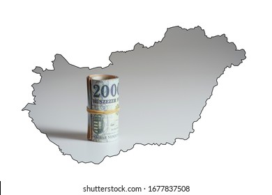 Map Of Hungary. Rolled Up Hungarian Forint 20,000 Forint Banknote Ferenc Deák.