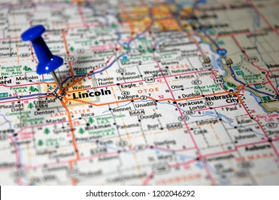 A Map Of Lincoln, Nebraska Marked With A Push Pin.