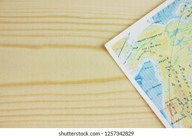 map on wooden table .