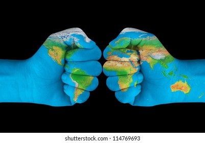 Map painted on hands showing concept of having the crash of the world in our hands