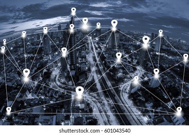 Map pin flat and network connection concept on blue tone Aerial view of cityscape Bangkok business district  background.