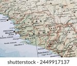 The map section displays Sierra Leone, a West African country known for its stunning landscapes and vibrant culture. Situated along the Atlantic coast, it features lush rainforests, pristine beaches, 