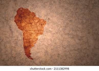 Map Of South America On A Old Ancient Vintage Crack Paper Background