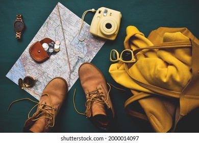 Map and travel essentials flatlay