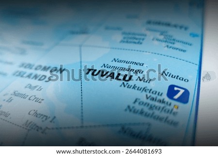 Map of Tuvalu with shadowed top and bottom. Selective focus on label, close-up view