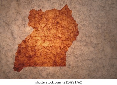 map of uganda on a old ancient vintage crack paper background