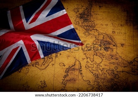 Map of United Kingdom on world vintage map showing British Empire.