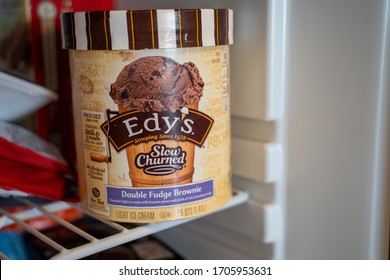 Maple Grove, Minnesota - April 15, 2020:  Edys Slow Churned Ice Cream In Double Fudge Brownie Flavor In A Freezer. Selective Focus On The Brand Name