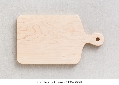 Maple Handmade Wood Cutting Board On The  Linen