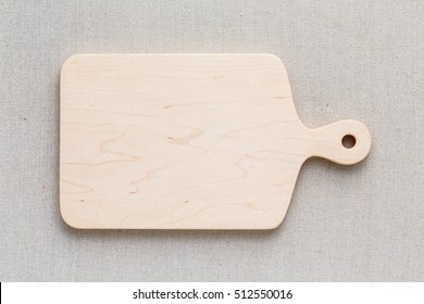 Maple Handmade Wood Cutting Board On The  Linen