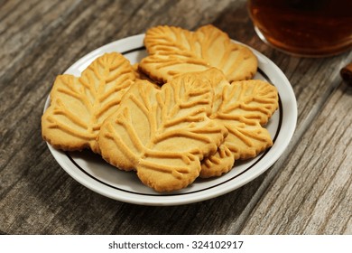 Maple Leaf Cookies With Apple Cider On Side, Selective Focus