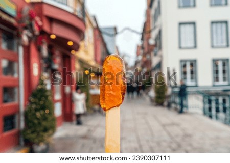 Maple syrup candy on stick in Quebec City, Canada