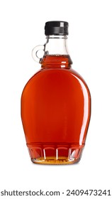 Maple syrup in a glass bottle. Bottled Canadian maple syrup made from the sap of maple trees in which sucrose is the most prevalent sugar. Used in baking, as condiment, sweetener and flavouring agent.