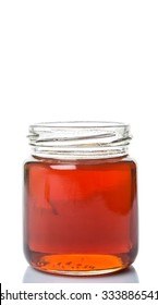 Maple Syrup In A Mason Jar Over White Background