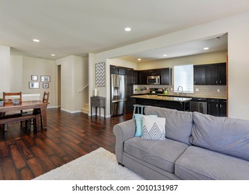 Maple Valley, WA, USA - July 13, 2021: Modern residential living room, dining room, and kitchen interior - Shutterstock ID 2010131987