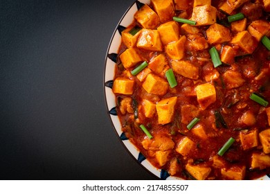 Mapo Tofu - The traditional Sichuan dish of silken tofu and ground beef, packed with mala flavor from chili oil and Sichuan peppercorns - Asian food style