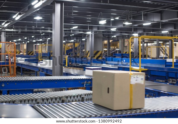 Mar.21.2019-Seoul Korea, Automated warehouse.\
Boxes moving on\
conveyer