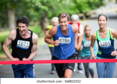 Marathon Athletes Close To The Finish Line In Park