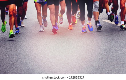 Marathon Athletes Competing In Fitness And Healthy Active Lifestyle Feet On Road 