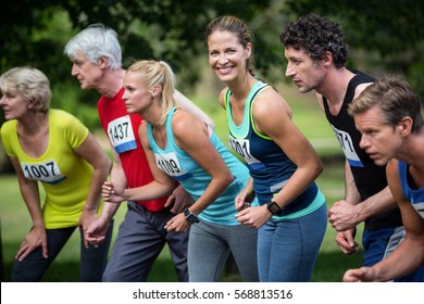 Marathon Athletes On The Starting Line In Park