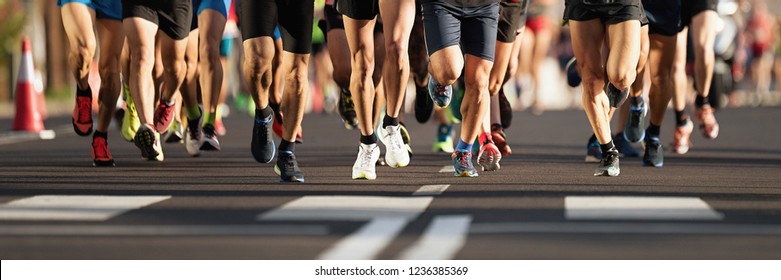 Marathon Runners Running On City Road, Large Group Of Runners