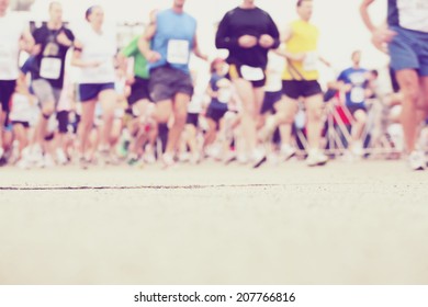 Marathon Runners At The Starting Line 