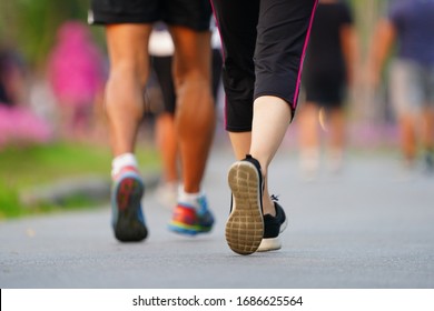  Marathon Running Blured Of People Are Walking In Urban Park. Blurred In Fitness And Healthy Active Lifestyle Feet On Road                                   