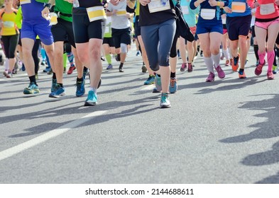 Marathon Running Race, Many Runners Feet On Road Racing, Sport Competition, Fitness And Healthy Lifestyle Concept