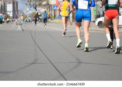 Marathon Running Race, Many Runners Feet On Road Racing, Sport Competition, Fitness And Healthy Lifestyle Concept