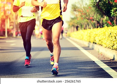 Marathon Running Race, People Feet On City Road 