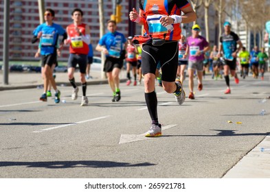 Marathon running race, runners feet on road, sport, fitness and healthy lifestyle concept
