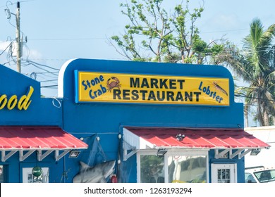Marathon, USA - May 1, 2018: KING Seafood Market and Restaurant, cafe sign in Florida key, blue store, shop on street of overseas highway road, US 1
