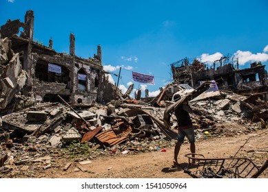 Marawi City, Philippines - May 10, 2018: A Year After The Marawi Siege, Residents Were Allowed To Salvage Whatever They Can From Their Homes At Ground Zero.