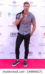 Marbella, Malaga / Spain - July 11 2019 : Marbellla Fashion Show Charity Event in Puerto Banus Marbella with Eva Longoria as ambassador Guest and Giovanni Bonamy