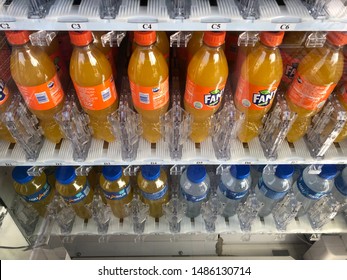 Marbella, Spain - 08 12 2019: Soft Drinks, Fanta Bottles And Aquarius In Two Flavors Aligned In A Fridge In A Store In Marbella Southern Spain