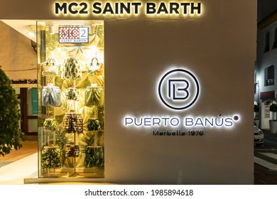 Marbella, SPAIN - July 16 2020: Puerto Banus sign , illuminated at night. famouse travel destination and location in Marbella - Costa del Sol. Shopping area, restaurants, night lifestyle. 