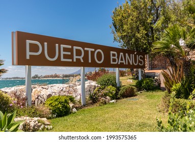 Marbella, SPAIN - July 16 2020: Puerto Banus sign in famouse travel destination and luxury harbour of Marbella - Costa del Sol. Shopping area, restaurants, night lifestyle. 