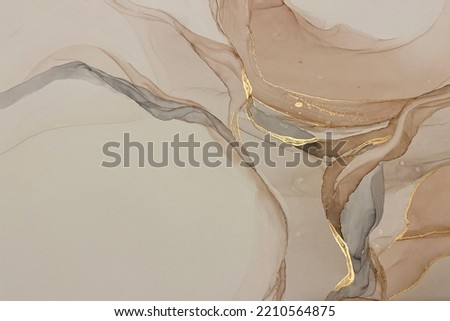 Marble, acrylic abstract background. Nature marbling artwork texture. Golden Glacier Alcohol Dye Ink is translucent. Abstract multicolored marble texture background. Design wrapping paper, wallpaper. 