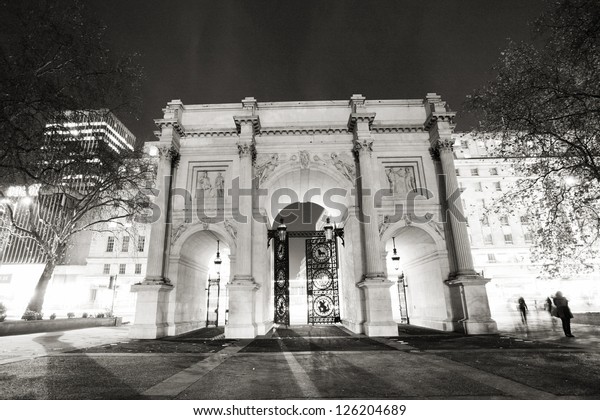The Marble\
Arch, designed in 1825 by John Nash, completed in 1833, located in\
central London, near Oxford Street, to commemorate Britain\'s\
victories in the Napoleonic\
Wars.
