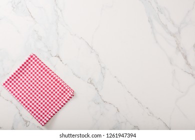 Marble background with plaid textile and copy space for text. - Powered by Shutterstock