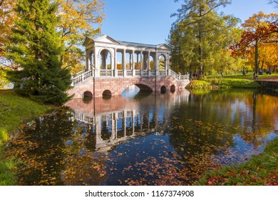 Marble bridge in autumn foliage in Catherine park, Tsarskoe Selo (Pushkin), St. Petersburg, Russia
