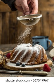 Marble Cake Cup Of Coffee Powder Sugar Kitchen Vintage Utensil And Fresh Fruit Berries.