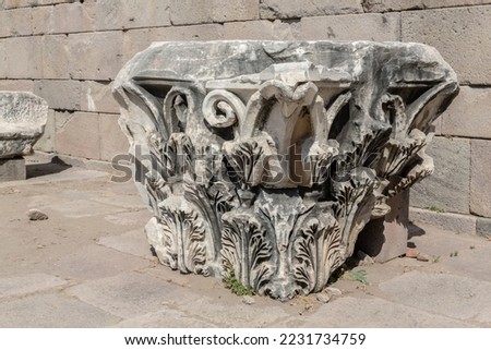 Marble capitals. Corinthian order, ruined Temple of Trajan in Pergamon Ancient City. Close up, selected focus. History, art or architecture concept. Bergama, Turkey