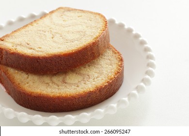 Marble Caramel Pound Cake Sliced On White Dish