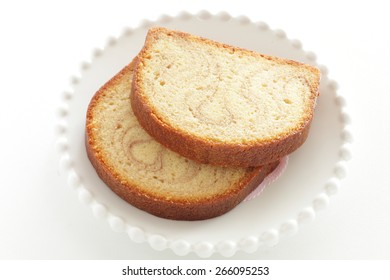 Marble Caramel Pound Cake Sliced On White Dish