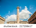 Marble Column of Marcus Aurelius in Piazza Colonna square in Rome, Italy. It is a Doric column about 100 feet high built in 2nd century AD and featuring a spiral relief.