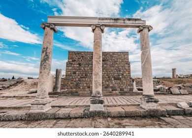 Marble columns supporting lintel over brick wall at archaeological site of Pergamon, Turkiye