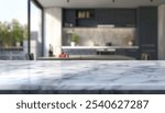 Marble countertop in a modern kitchen with an out-of-focus background.